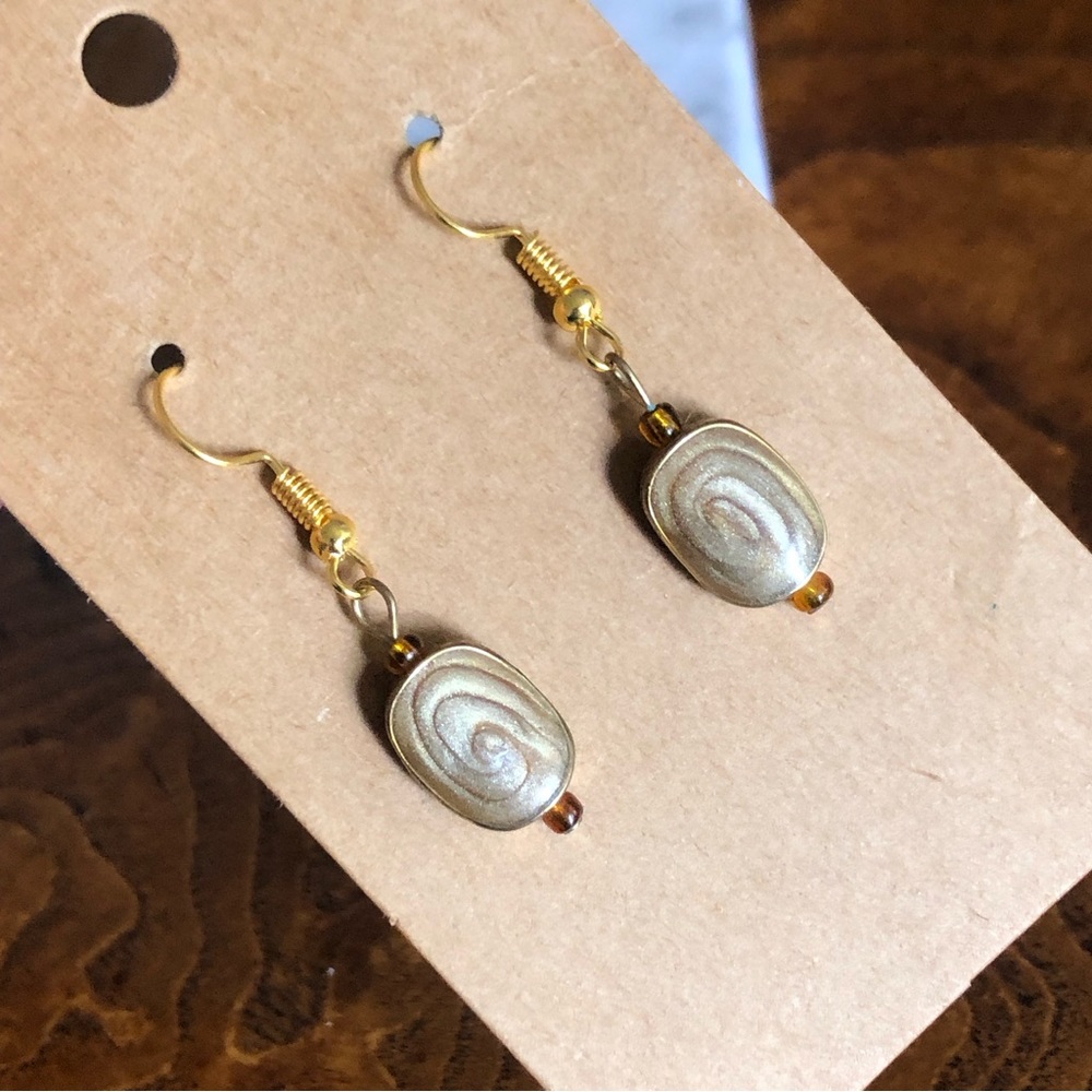 Handcrafted swirl enamel dangle earrings